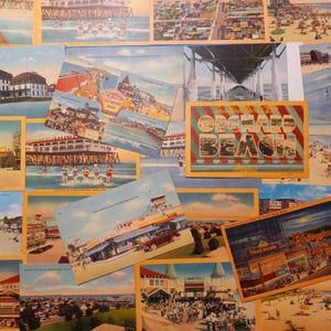 May include: A collection of vintage postcards featuring beach scenes, piers, and buildings. The postcards are in various sizes and orientations, with a focus on Orchard Beach. The color palette includes blues, yellows, and greens, evoking a sense of nostalgia.