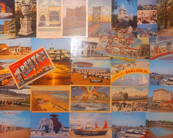 May include: A collection of vintage postcards featuring various scenes. The postcards depict landmarks, beaches, and cityscapes, with some displaying text like "Greetings from Trenton, NJ" and "Greetings from Avalon, N.J.". The color palette includes blues, oranges, and browns.