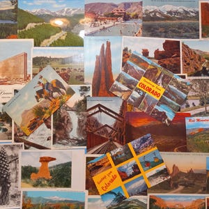May include: A collection of vintage postcards featuring scenic views of Colorado, including mountains, bridges, and red rock formations. The postcards are arranged in a collage style, with some overlapping. The text on the postcards includes "Greetings from Colorado" and "Red Mountain".