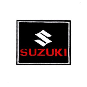 May include: Black and white embroidered patch with a white "S" logo and the word "SUZUKI" in red lettering.