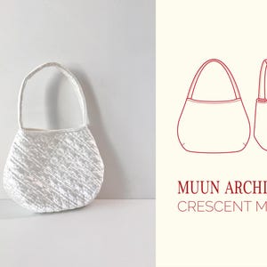 May include: A white quilted crescent-shaped handbag with a short handle. The bag is shown next to a line drawing of the bag with the text "MUUN ARCHIVE CRESCENT MINI".