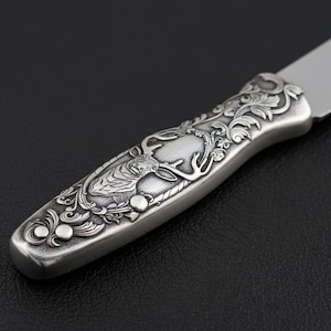 Knife Scroll SVG – Ornamental Engraving Vector File

CNC Laser Knife Engraving Design – Scroll Pattern

Decorative Scrollwork Vector for Knife Bolster

Engraving Pattern SVG DXF PNG AI – Knife Handle Design

Knife Scroll Engraving File – Instant Digital Download