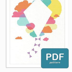 May include: A colorful cross-stitch pattern of a kite flying in the sky. The kite is made up of various shapes and colors, including orange, yellow, blue, green, and pink. The pattern is designed for cross-stitch and includes a PDF download.