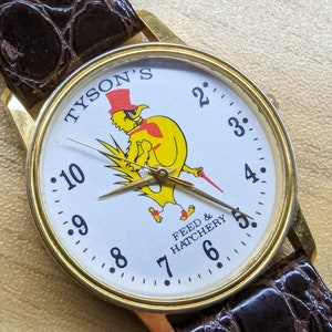 Reloj de pulsera vintage con publicidad de pollos TYSON&#39;S FEED & Hatchery