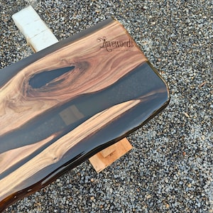 Wall shelf of epoxy resin and walnut wood, all live edge, made to order