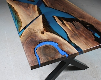Dinning room table of walnut wood and resin, made to order handmade furniture
