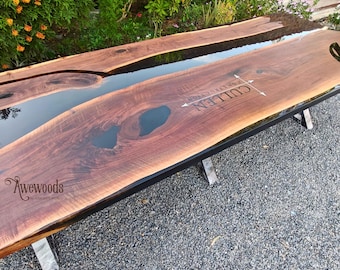 Board room table of walnut and epoxy resin with logo