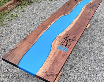 Custom logo table top of walnut wood and blue epoxy resin