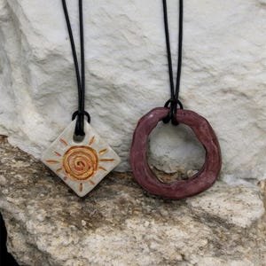 Handmade Clay Pendant Necklace – Boho Sun Design & Rustic Circle Charm