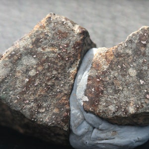 Meteorite 14.25 grams NWA 869 split in 2 and highly polished