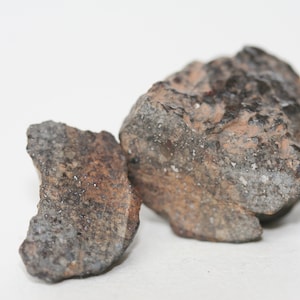 Meteorite 19.92 grams NWA869 split in 2 and polished