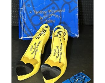 Zapatos de tacón vintage RAROS Vivienne Westwood Melissa amarillos con tira trasera y diseño de gelatina. Talla US 7, EUR 38.
