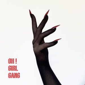 May include: A hand in a black fishnet glove, featuring long nails painted red at the tips. The words "OH! GIRL GANG" are stacked vertically in red on the left against a white backdrop. The hand is positioned in a claw-like pose.