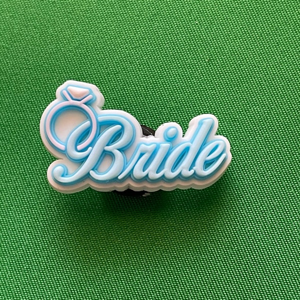 Bride with engagement ring shoe charm