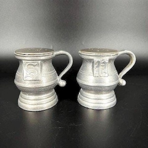 Vintage Pewter Salt and Pepper shakers. Great vintage condition with stoppers.