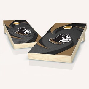 May include: A set of two brown and black wooden cornhole boards with a black and white bulldog mascot logo. The boards have a swirl design and a black and white checkered pattern.