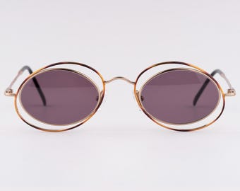 90s Italian Casanova Sunglasses: Gold Oval Steampunk Frames