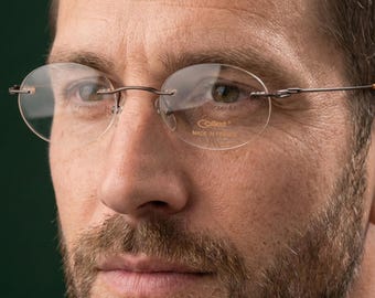Gafas ovaladas sin montura, ajuste ancho de 145 mm, Cottet France, estilo vintage de los años 90, montura oscura minimalista, óptica ligera NOS