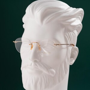 Ligne acoustique de lunettes sans monture en titane AL 052 BGP - Cadre doré rond japonais des années 2000 pour femme et homme - Nouveau stock ancien