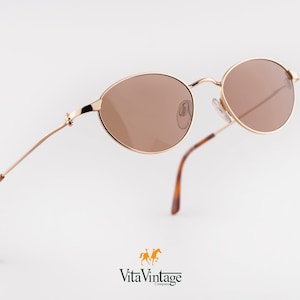 Óculos de sol vintage Silhouette dourados: estilo gatinho oval anos 90, novos e de estoque antigo
