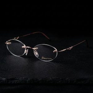 Occhiali da vista ovali senza montatura, vestibilità Petite 128 mm, montatura extra piccola, lenti placcate in oro rosa, stile vintage anni '90, Made in Italy