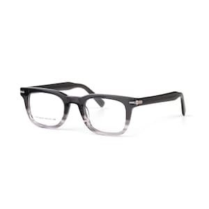 May include: Eyeglasses with a rectangular frame featuring a dark gray to clear gradient finish. The frame includes silver-tone metal accents at the hinges and temples. The lens is printed with the text KH20008A 49-23-148 in a clear font.