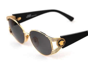 Okulary przeciwsłoneczne Gianni Versace S64 Iconic, złoty medalion Meduzy, styl hip-hopowy z lat 90., szeroka szerokość 145 mm, rzadki eksponat muzealny w kolorze czarno-złotym