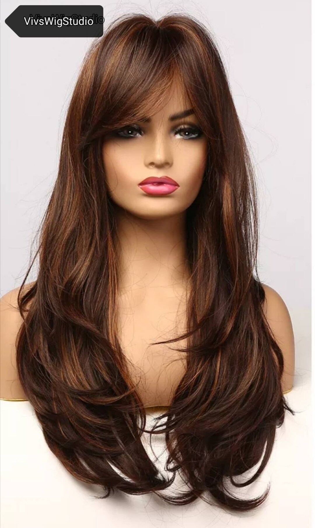 Long Brown Wavy Wig With Bronze and Copper Tone Highlights Has Heat