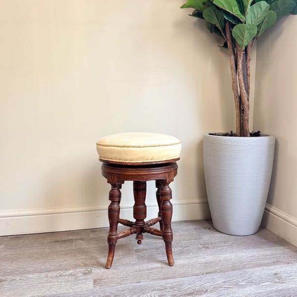 Taburete de piano vintage de caoba: asiento redondo de altura ajustable
