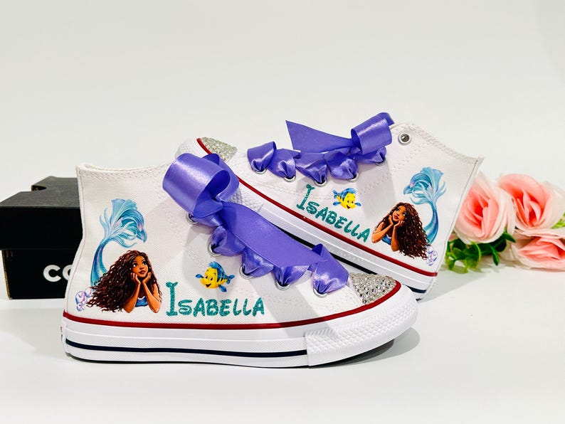 May include: A set of three ceramic mugs with a speckled, matte finish. The mugs are in shades of cream, light gray, and dark gray. Each mug has a simple, minimalist design, perfect for coffee or tea.