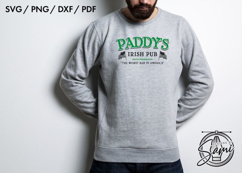 May include: A gray sweatshirt with a green and black graphic design that reads "Paddy's Irish Pub South Philadelphia "The Worst Bar in America".