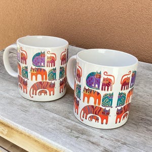 Pair Laurel Burch cat mugs.  Pair vintage Laurel Burch Fantastic Felines coffee mugs.