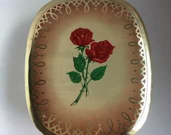 Lata vintage de tamaño mediano con tapa. Lata vintage con rayas doradas y rosas.