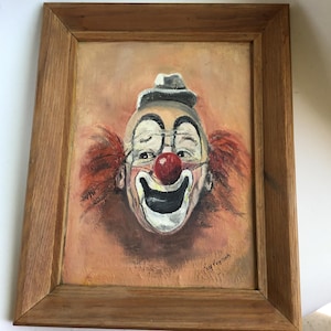 Vintage clown painting.  Small vintage artist signed unscary clown painting in period frame.