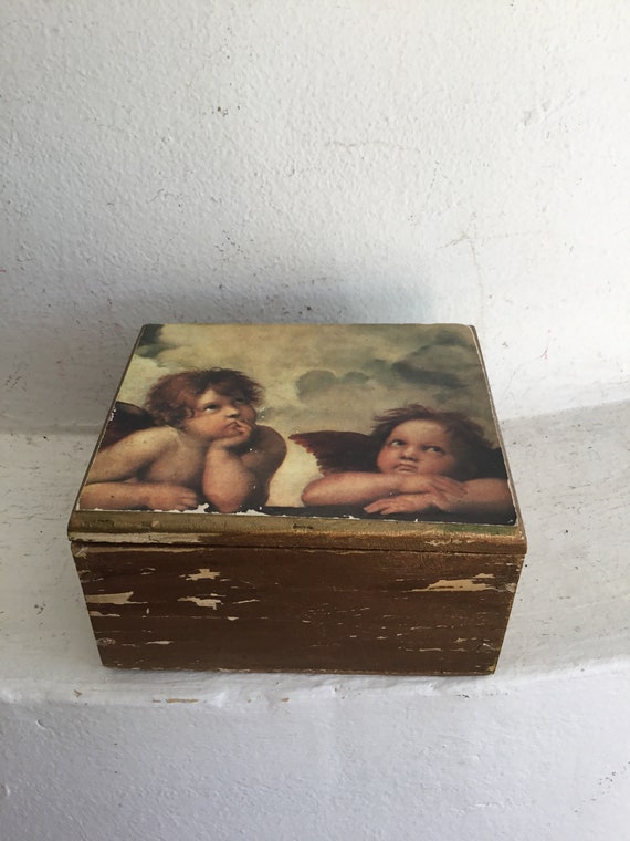 Small chippy gold wood box with Rafael’s cherubs.… - image 1