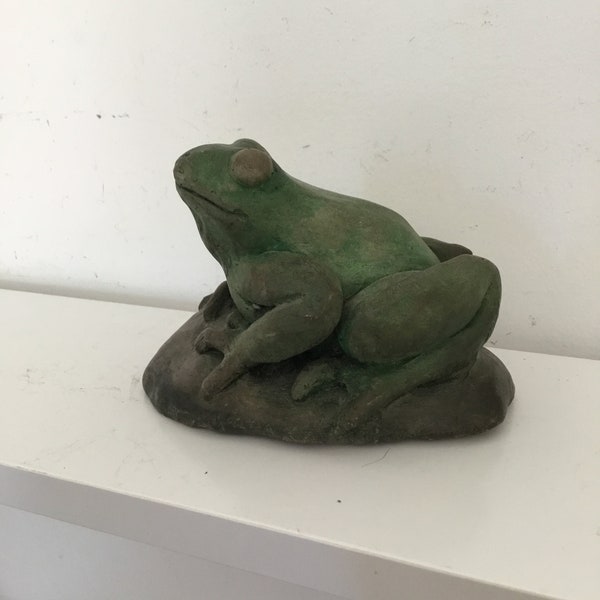 Small handmade fired clay frog figure.  Small cute green artist made frog sculpture.