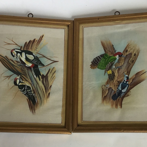 Pair of small vintage bird paintings on silk.  Vintage framed bird paintings on fabric.