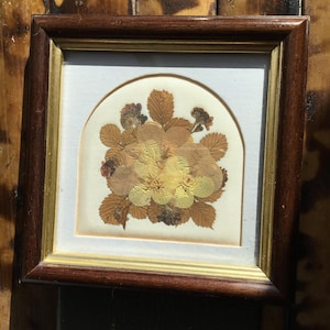 Small pressed flower arrangement.  Very small vintage well framed artist signed pressed flower arrangement made in England.