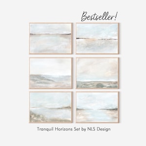 May include: Six framed abstract landscape art prints. The artwork features soft, muted tones of blue, beige, and gray, creating a serene and tranquil atmosphere. The text "Bestseller!" is written in cursive at the top, and "Tranquil Horizons Set by NLS Design" is at the bottom.