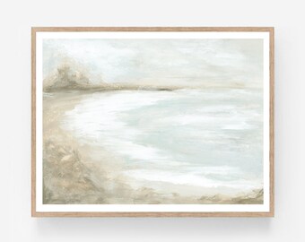 May include: A framed abstract painting of a beach scene with soft, muted colors of blue, white, and brown. The painting depicts a sandy beach with waves gently lapping at the shore, and a hazy sky in the background.