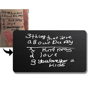 May include: A black chalkboard with white chalk writing that says "3 things that I love about Dad are: 1. Kindness 2. Love 3. You love your kids".