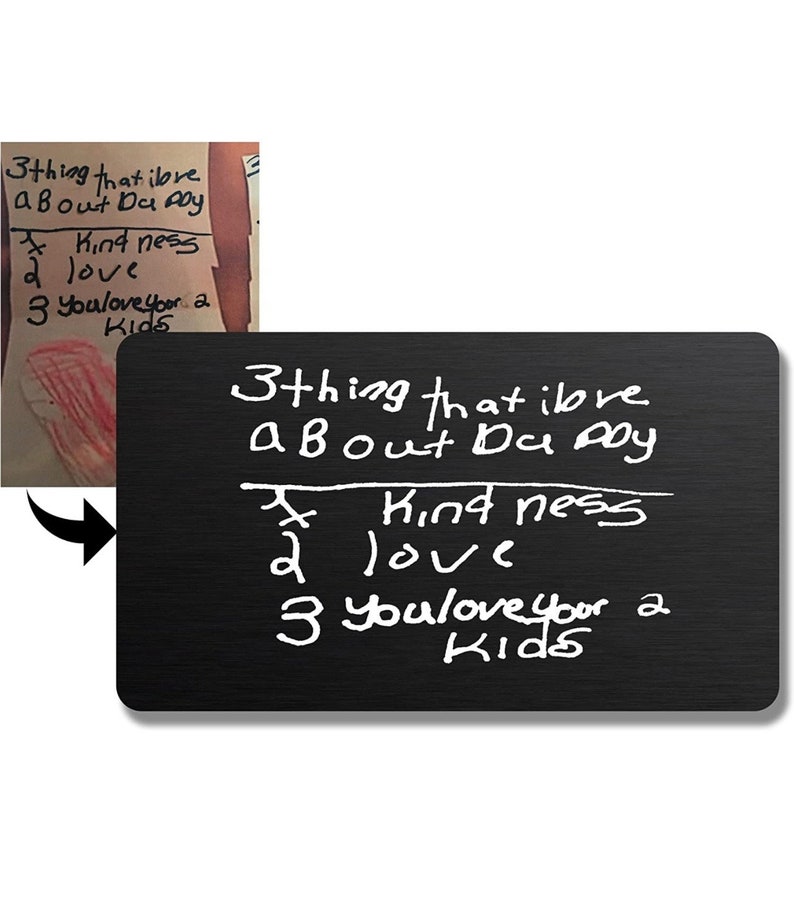 May include: A black chalkboard with white chalk writing that says "3 things that I love about Dad are: 1. Kindness 2. Love 3. You love your kids".