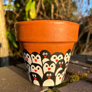 Hand painted penguin plant pot