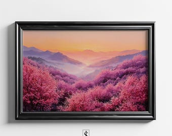 May include: A framed landscape painting featuring a vibrant scene of pink flowering trees and rolling hills under a sunset sky. The artwork is enclosed in a black frame and displays the text "JITKAMON STUDIO" at the bottom.