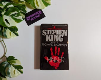 Thinner by Richard Bachman (aka Stephen King)