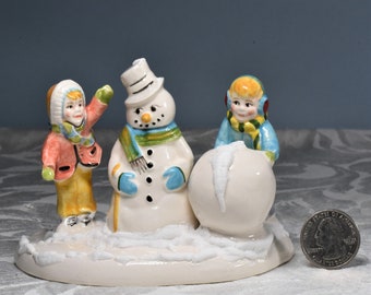 School Children with Snowman Accessory