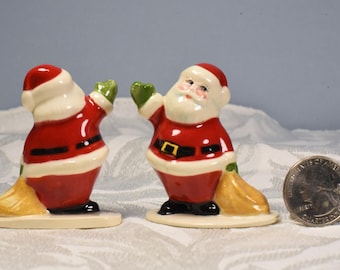 Pequeño Papá Noel con accesorio de bolsa