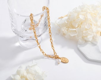 Golden Carved Pendant and Pearl Necklace