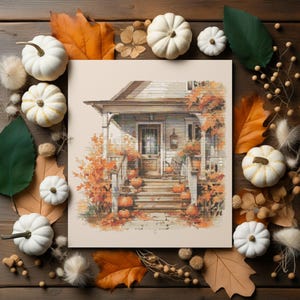 Puede incluir: Una pintura de acuarela de una casa blanca con un porche y escalones. El porche está decorado con calabazas y follaje de otoño. La casa está rodeada de hojas de otoño y calabazas.
