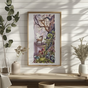 May include: A framed cross-stitch artwork depicting a forest scene with a deer, mushrooms, and a moth. The artwork features a large tree, ferns, and other foliage in shades of green, brown, and purple. The frame is made of light brown wood.
